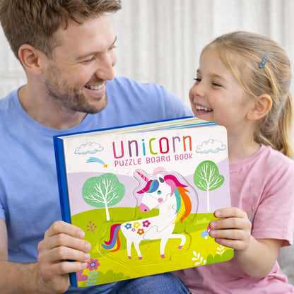 Unicorn Puzzle Board Book inside spread - Rainbow Land scene with Spankalin and Snowflake unicorn puzzle piece being placed